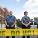 Police stand guard during a rally for Michael Brown outside the Ferguson Police Department in Missouri Aug. 30, 2014. Brown, an 18-year-old unarmed teenager, was shot and killed by Ferguson Police Officer Darren Wilson on Aug. 9.
Aaron P. Bernstein/Getty Images